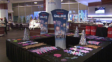 Display of activity items and tables with vertical stretch banners from Red Carpet event.