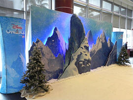 Full size completed 3D mountain and castle display with lighting and faux pine trees.